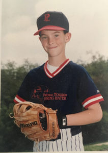 Ryan Bregante playing Little League baseball.